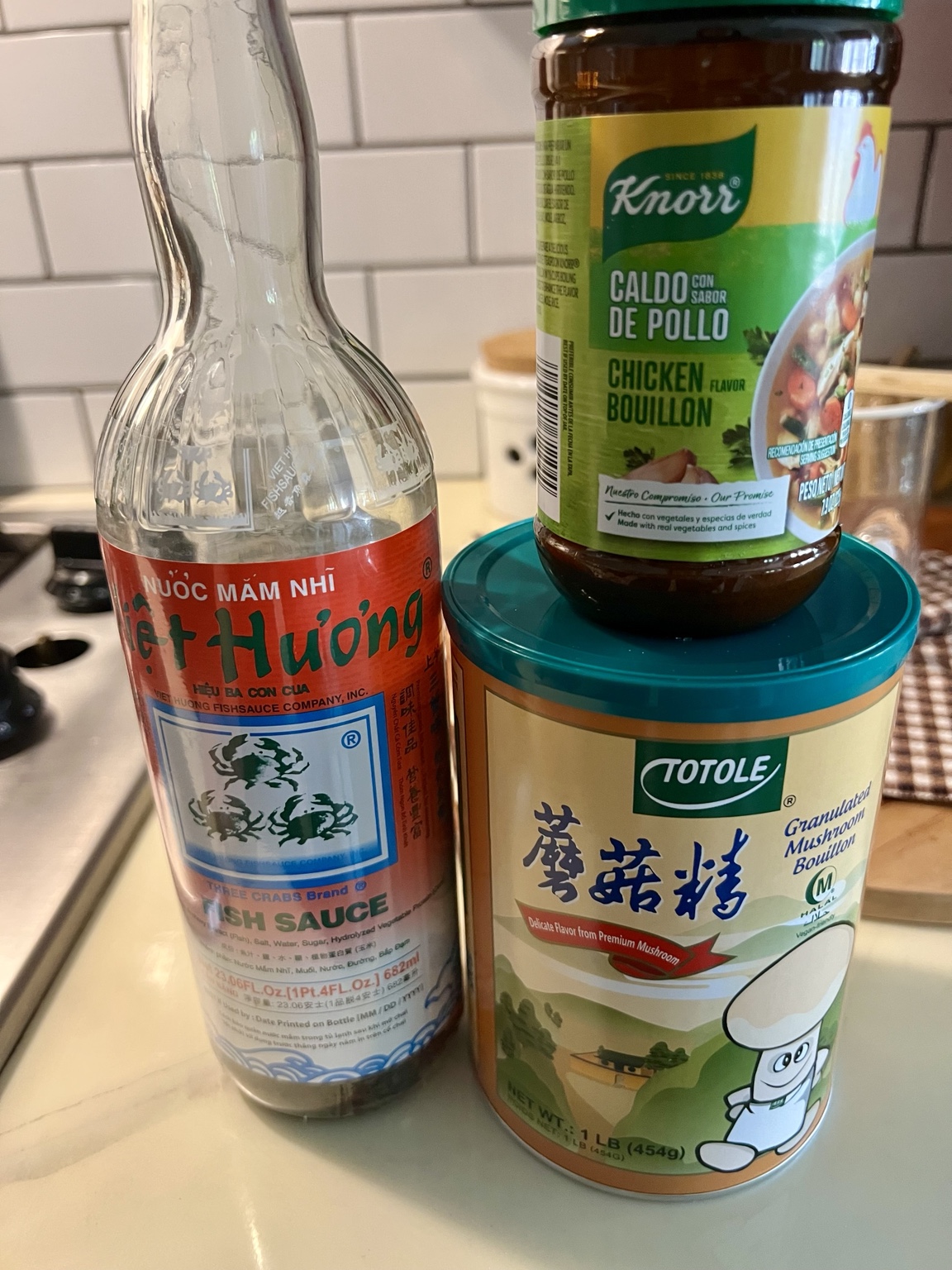 Three Crabs fish sauce, Knorr chicken bouillon, and Totole mushroom bouillon