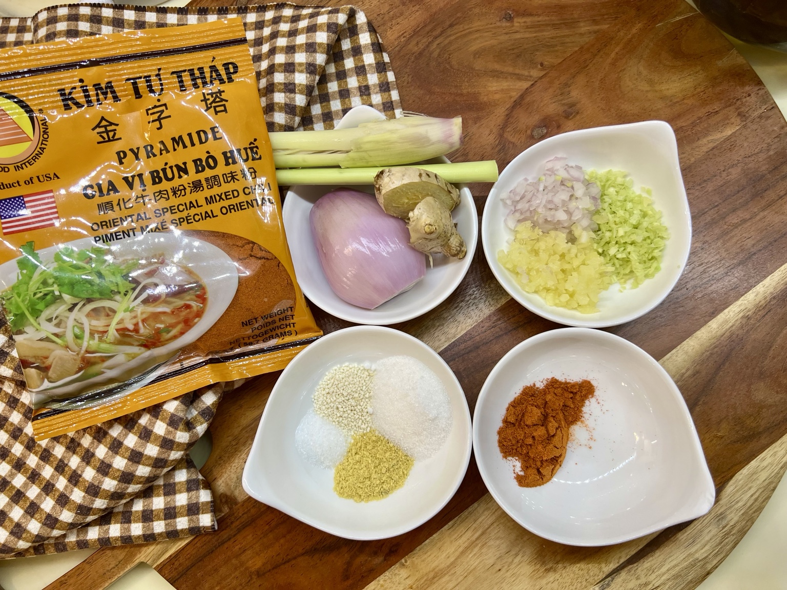 The aromatics, seasoning packet, and measured broth seasonings before cooking