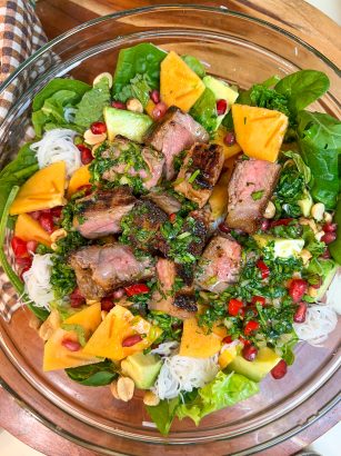Steak and vermicelli salad with persimmon and pomegranate
